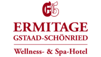 Logo des ERMITAGE Gstaad-Schönried, ein Wellness- & Spa-Hotel, mit rotem 'EG'-Monogramm.
